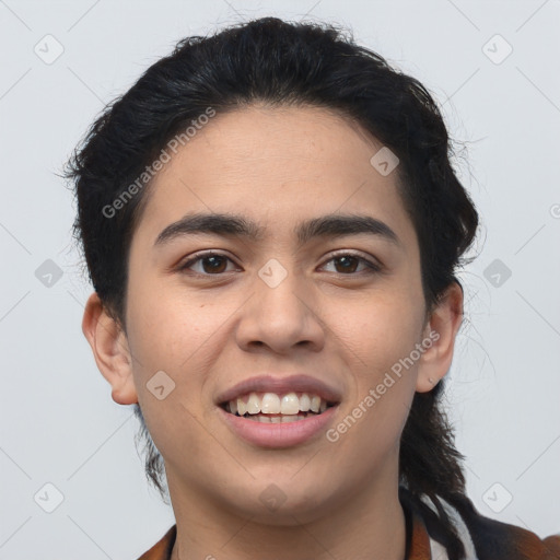 Joyful latino young-adult male with short  brown hair and brown eyes