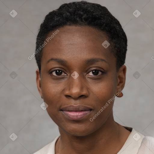 Joyful black young-adult female with short  black hair and brown eyes