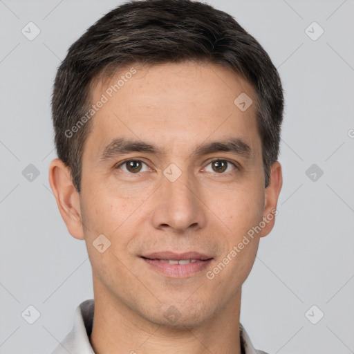 Joyful white adult male with short  brown hair and brown eyes