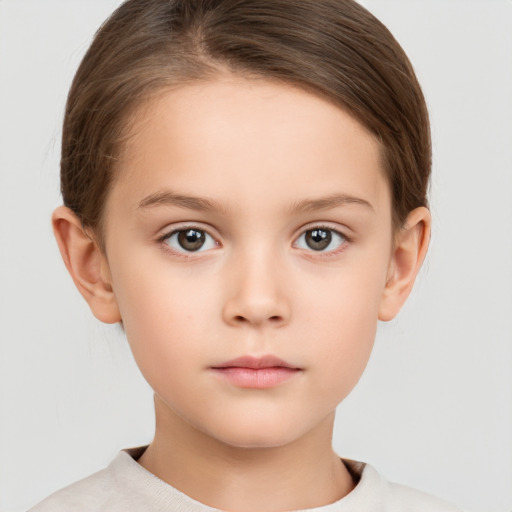 Neutral white child female with short  brown hair and brown eyes