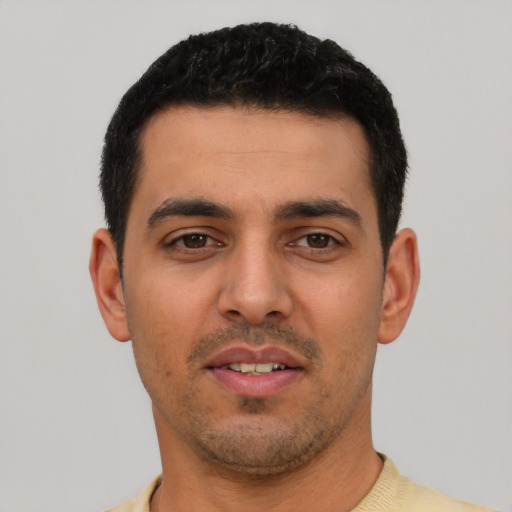 Neutral latino young-adult male with short  black hair and brown eyes