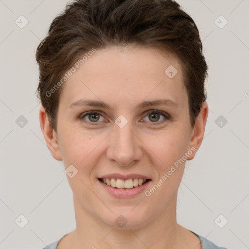 Joyful white young-adult female with short  brown hair and grey eyes