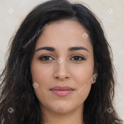 Joyful latino young-adult female with long  brown hair and brown eyes