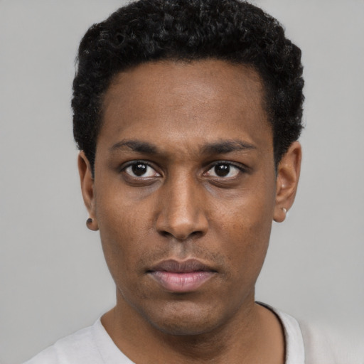 Neutral black young-adult male with short  black hair and brown eyes