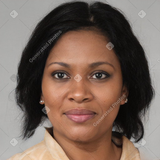 Joyful black young-adult female with medium  black hair and brown eyes