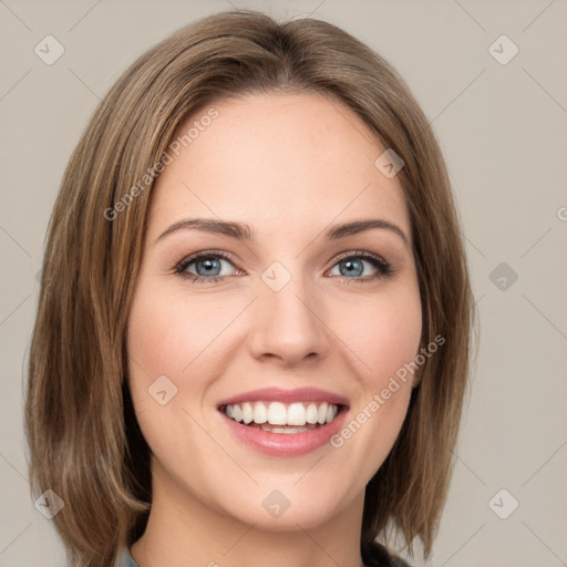 Joyful white young-adult female with medium  brown hair and green eyes