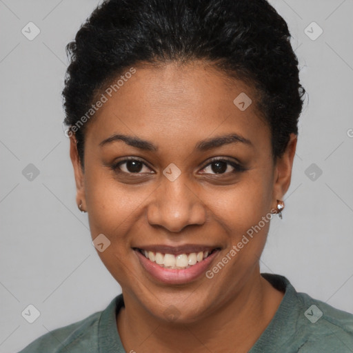 Joyful latino young-adult female with short  brown hair and brown eyes