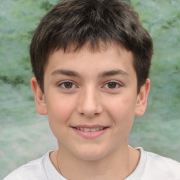 Joyful white child male with short  brown hair and brown eyes