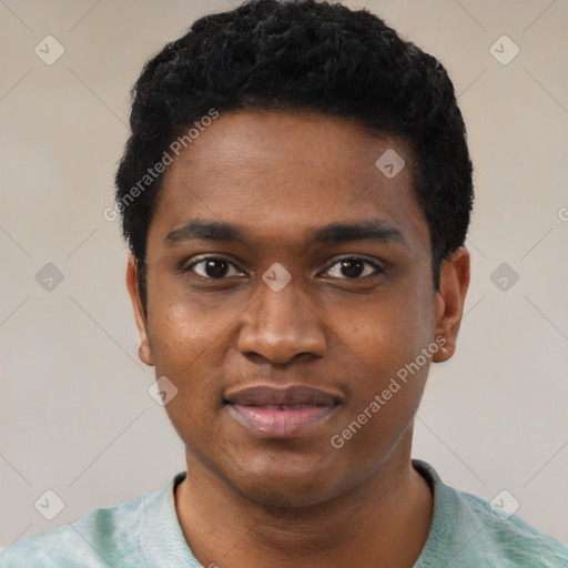 Joyful black young-adult male with short  black hair and brown eyes