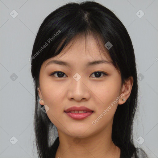 Joyful asian young-adult female with medium  black hair and brown eyes