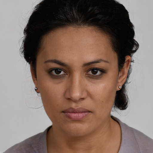 Neutral white young-adult female with medium  brown hair and brown eyes