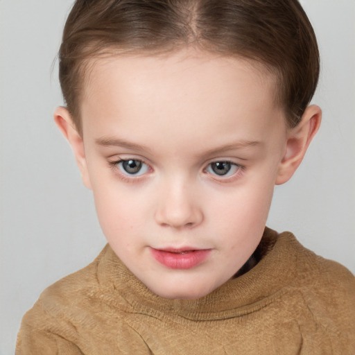 Neutral white child female with short  brown hair and grey eyes