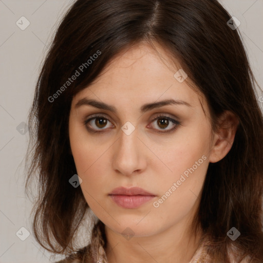 Neutral white young-adult female with long  brown hair and brown eyes