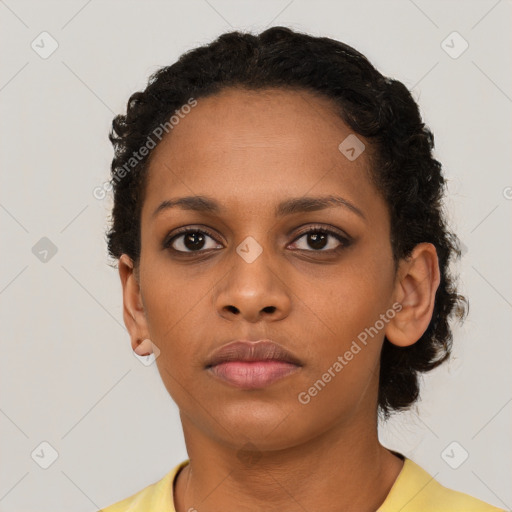 Neutral black young-adult female with short  black hair and brown eyes