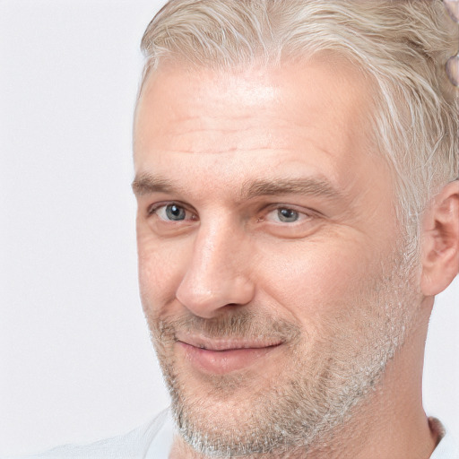 Joyful white adult male with short  brown hair and grey eyes