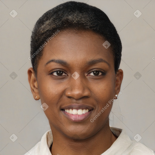 Joyful black young-adult female with short  black hair and brown eyes