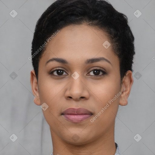 Joyful latino young-adult female with short  black hair and brown eyes