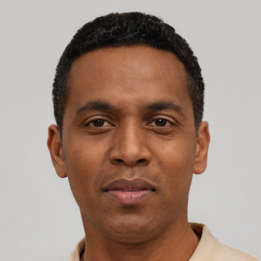 Neutral black young-adult male with short  black hair and brown eyes