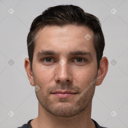 Neutral white young-adult male with short  brown hair and brown eyes