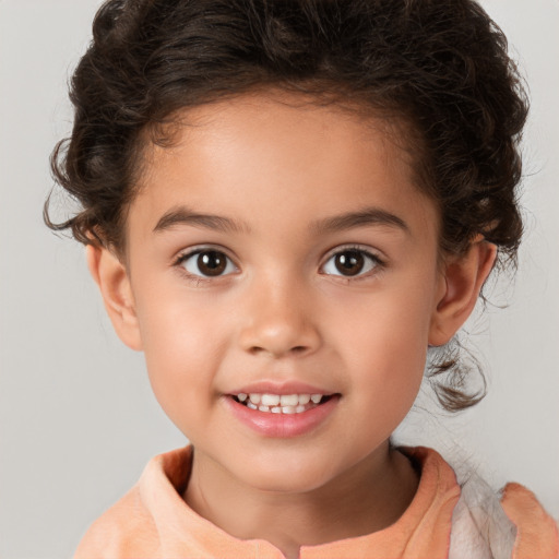 Joyful white child female with medium  brown hair and brown eyes