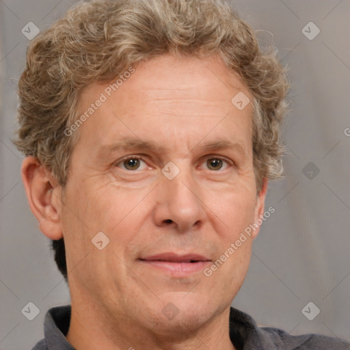 Joyful white adult male with short  brown hair and grey eyes