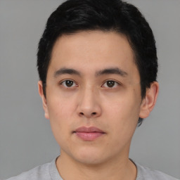 Neutral asian young-adult male with short  black hair and brown eyes