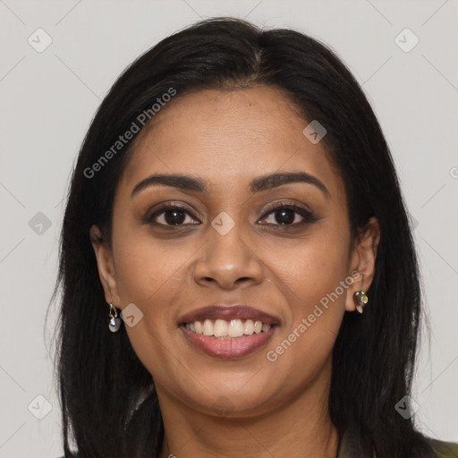 Joyful latino young-adult female with long  brown hair and brown eyes