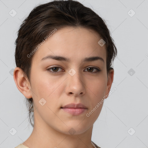 Neutral white young-adult female with short  brown hair and brown eyes