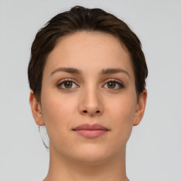 Neutral white young-adult female with short  brown hair and brown eyes