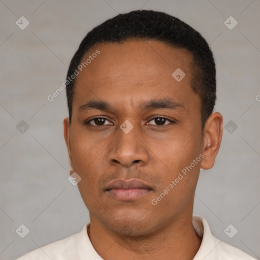 Neutral latino young-adult male with short  black hair and brown eyes