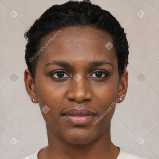 Joyful black young-adult female with short  black hair and brown eyes