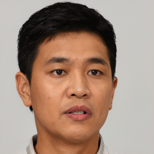 Neutral asian young-adult male with short  brown hair and brown eyes