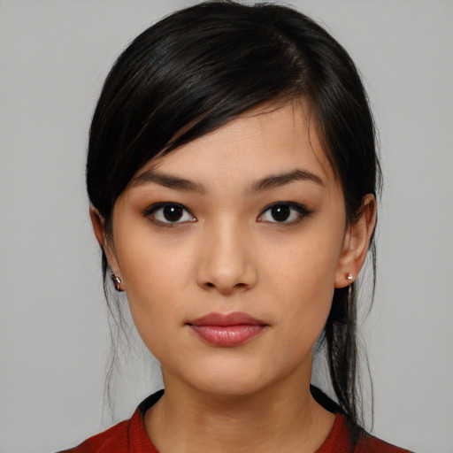 Neutral white young-adult female with medium  black hair and brown eyes