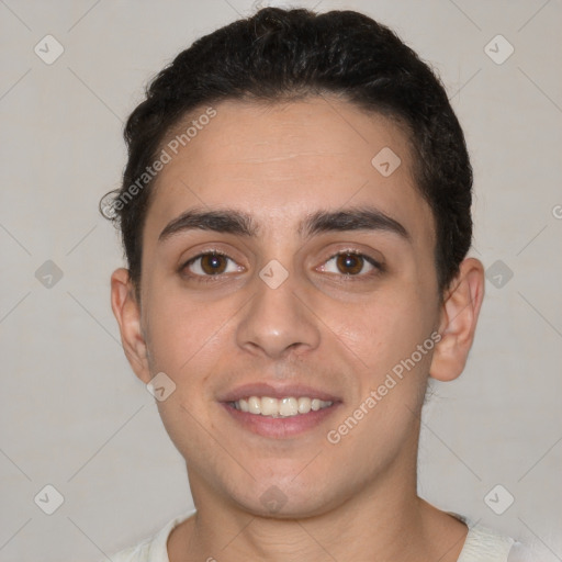 Joyful white young-adult male with short  brown hair and brown eyes