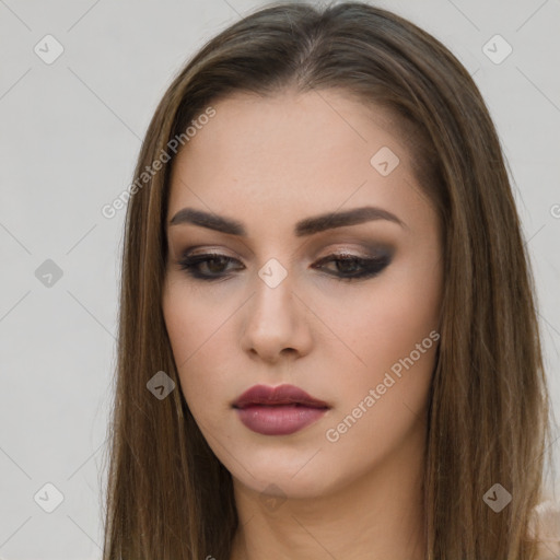 Neutral white young-adult female with long  brown hair and brown eyes