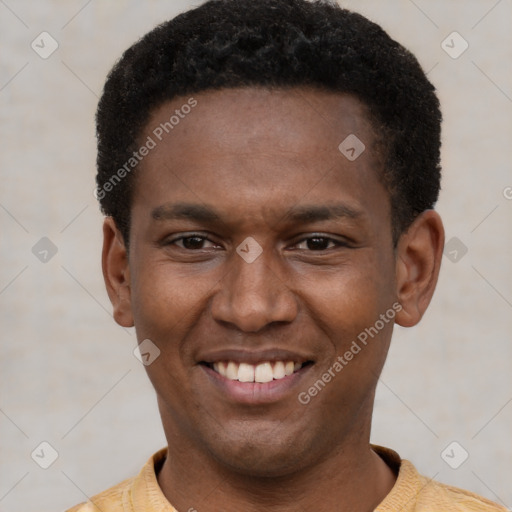 Joyful latino young-adult male with short  brown hair and brown eyes