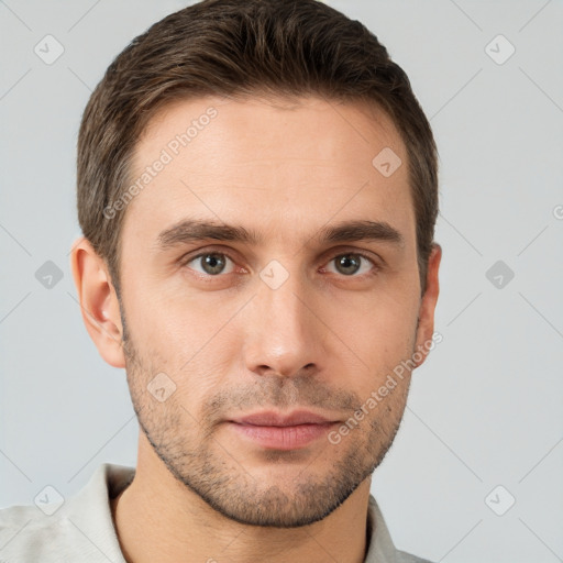 Neutral white young-adult male with short  brown hair and brown eyes