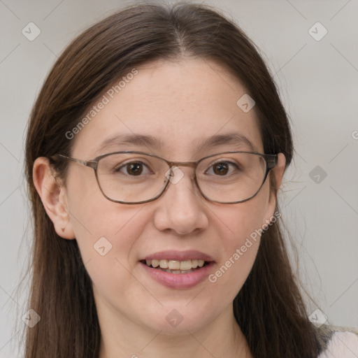 Joyful white adult female with medium  brown hair and grey eyes