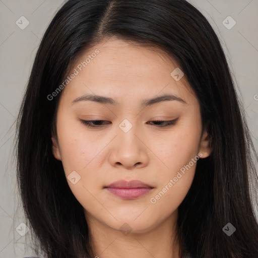 Joyful asian young-adult female with long  brown hair and brown eyes