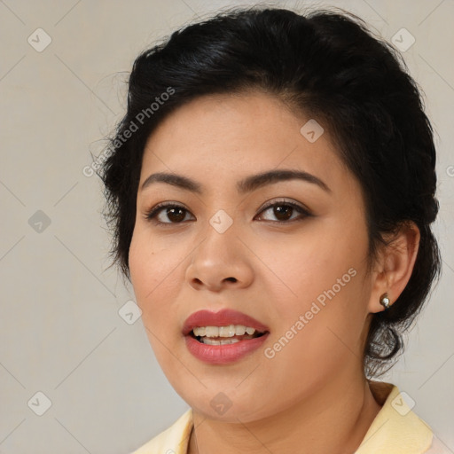 Joyful latino young-adult female with medium  brown hair and brown eyes