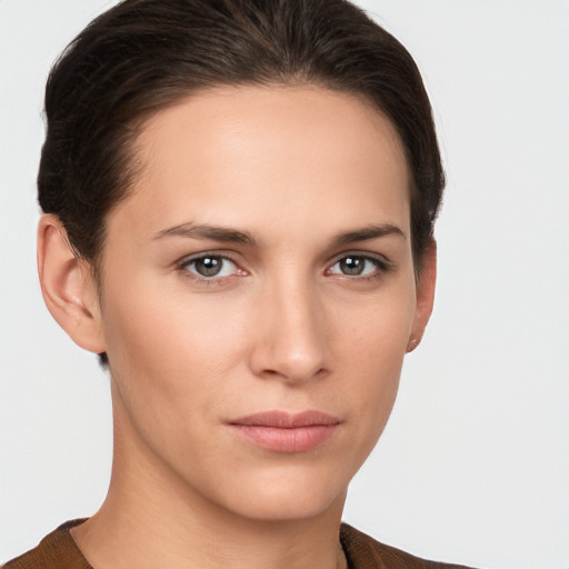 Neutral white young-adult female with short  brown hair and brown eyes