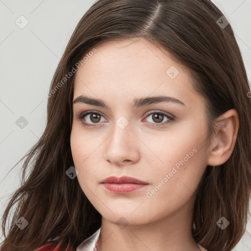 Neutral white young-adult female with long  brown hair and brown eyes