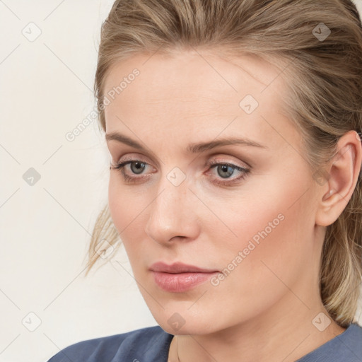 Neutral white young-adult female with medium  brown hair and blue eyes