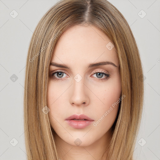 Neutral white young-adult female with long  brown hair and brown eyes