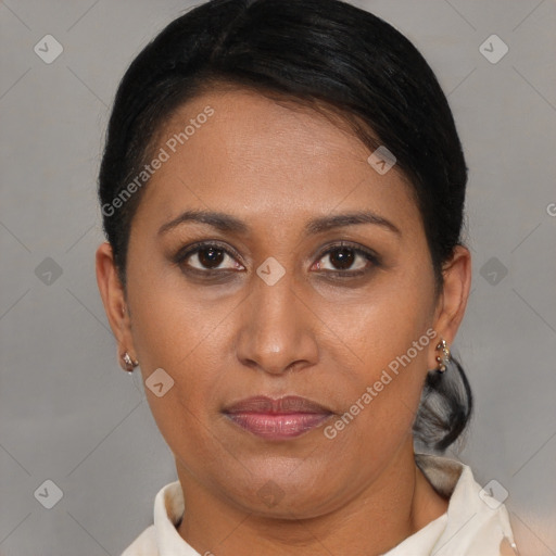 Joyful latino young-adult female with short  brown hair and brown eyes