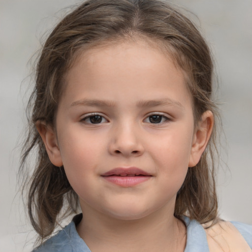 Joyful white child female with medium  brown hair and brown eyes