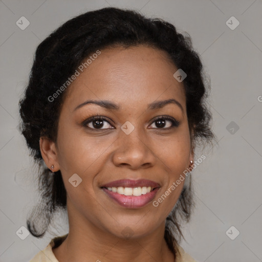 Joyful black adult female with medium  brown hair and brown eyes