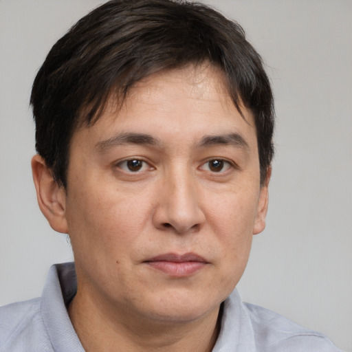 Neutral white adult male with short  brown hair and brown eyes