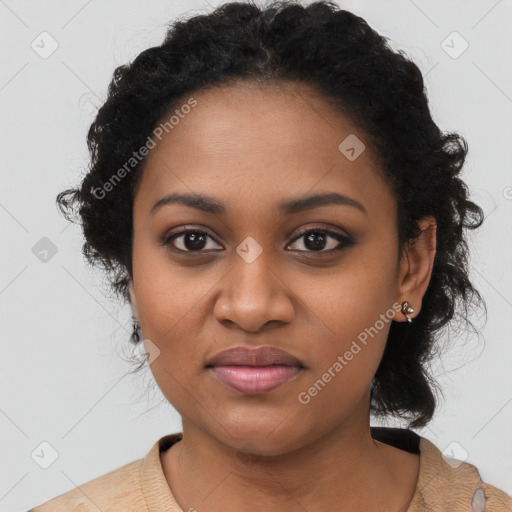 Joyful black young-adult female with medium  black hair and brown eyes