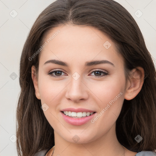 Joyful white young-adult female with long  brown hair and grey eyes